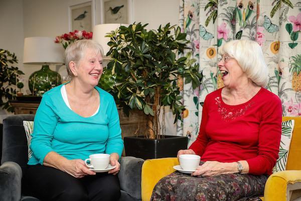 GOOD COMPANY. Colten Care is inviting people to banish loneliness with Tea & Togetherness. Margaret Howl, right, and Sue Turner enjoy one of the monthly get-togethers.