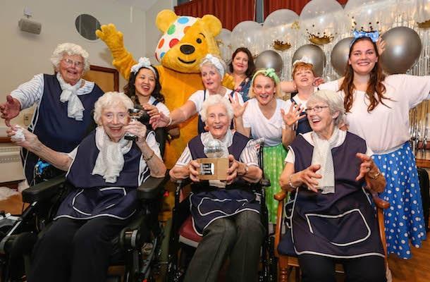 Colten Care residents and team members with Pudsey Bear at their Strictly Come Tea Dance in Lymington in aid of Children in Need.
