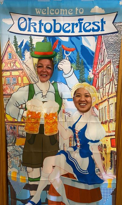 Companionship team member and native German speaker Christina Holliday, left, and Companionship team leader Rose Arcellana