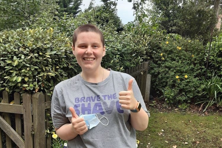 Colten Care healthcare assistant after having her head shaved