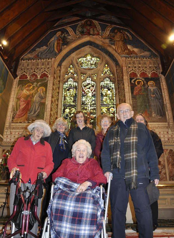 Residents from Belmore Lodge visit the newly restored art at St Mark's Church Pennington