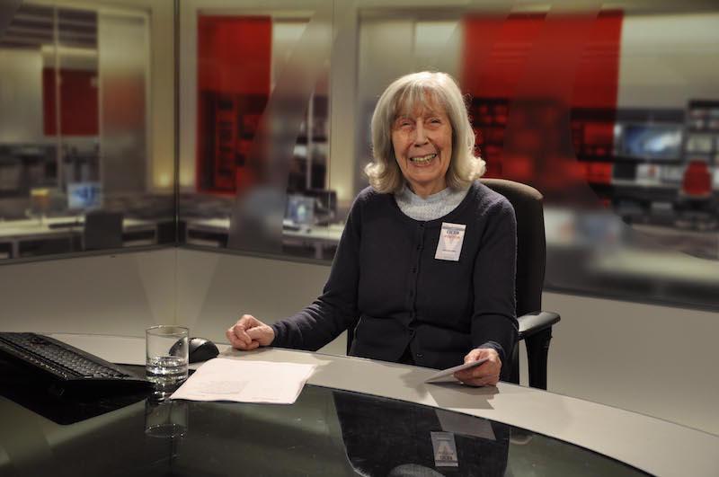 Enjoying the limelight of the BBC South Today presenter's chair is 83-year-old Pearl Durrant, a resident at Colten Care's Linden House care home in Lymington