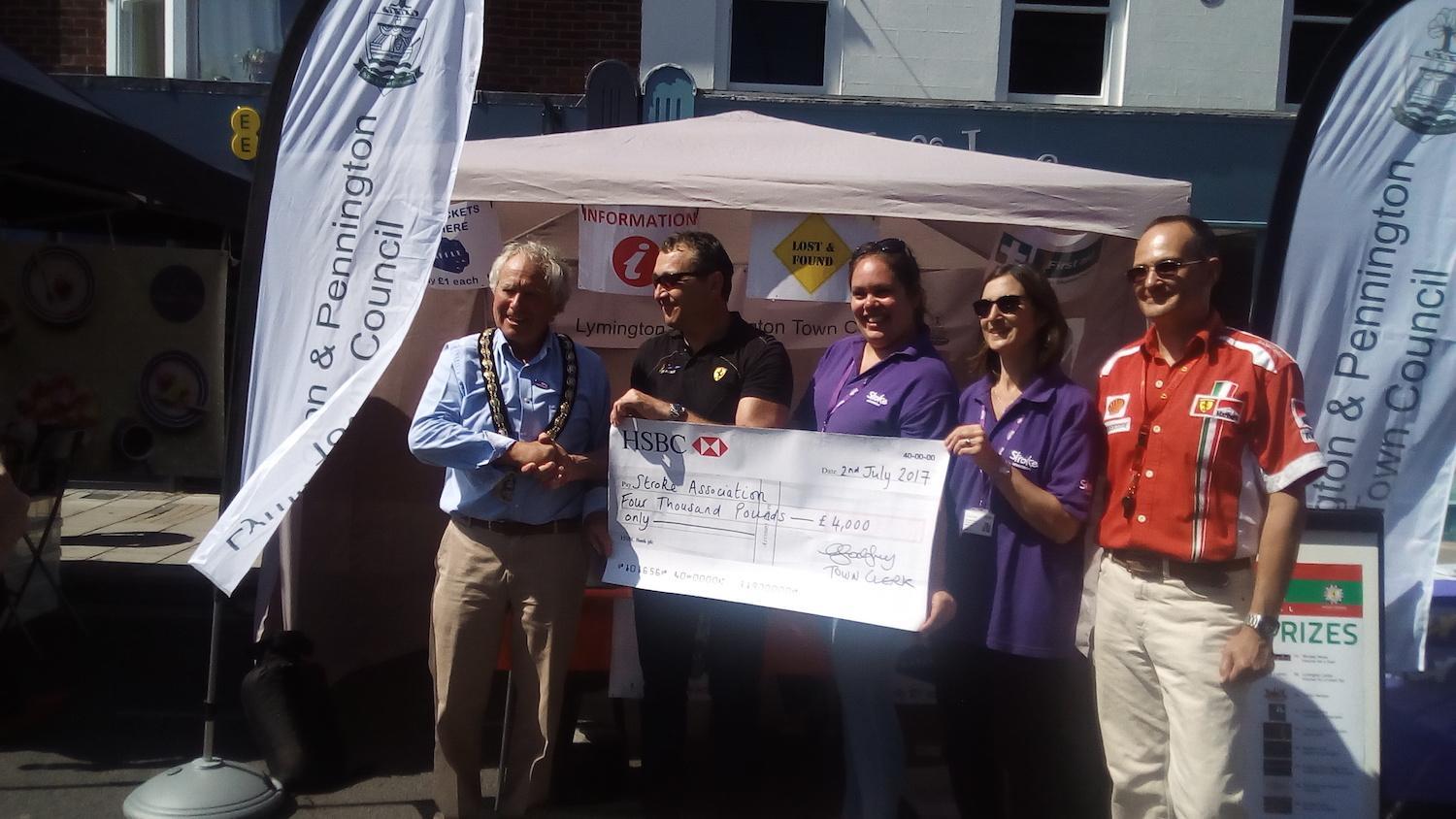 Italia Festival team hand over £4000 to the Stroke Association in Lymington