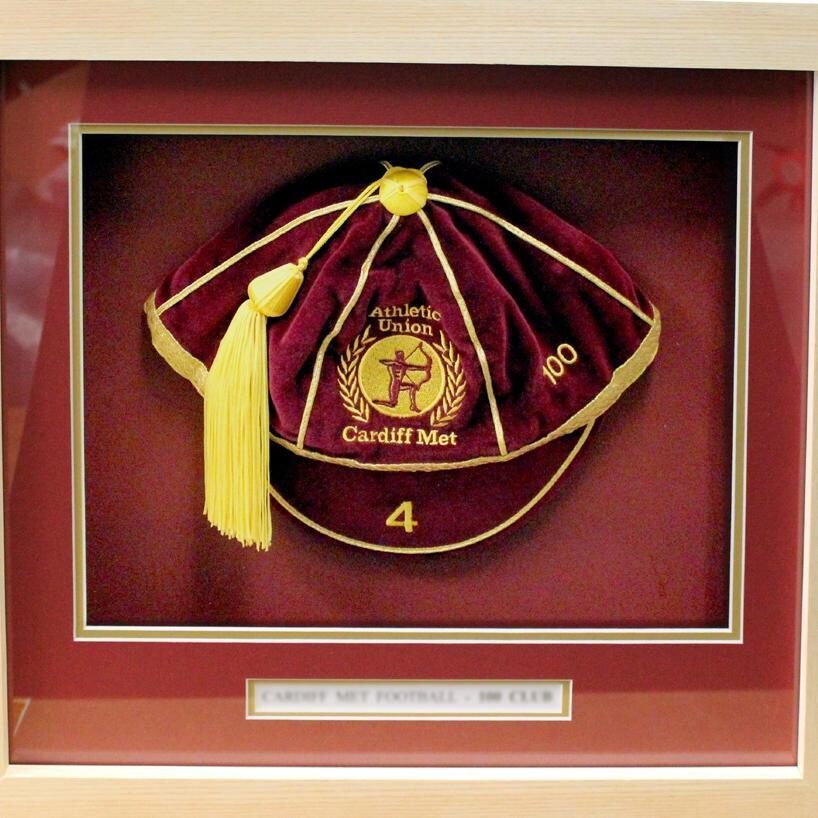 in the frame framing - framed football cap