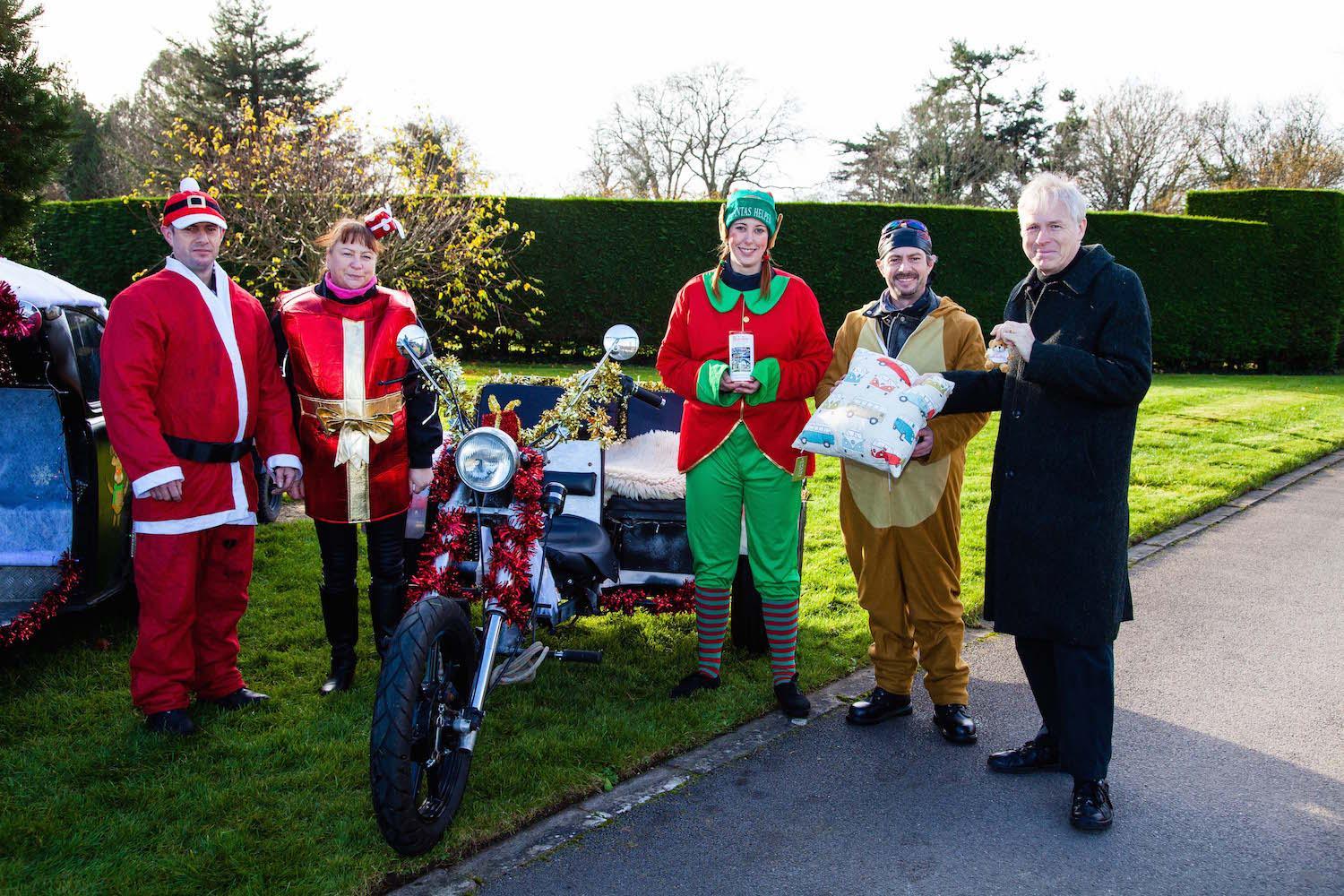 Lord Montagu presents Best Dressed Family award to Sheryl Katie Scott and Adam Hayward
