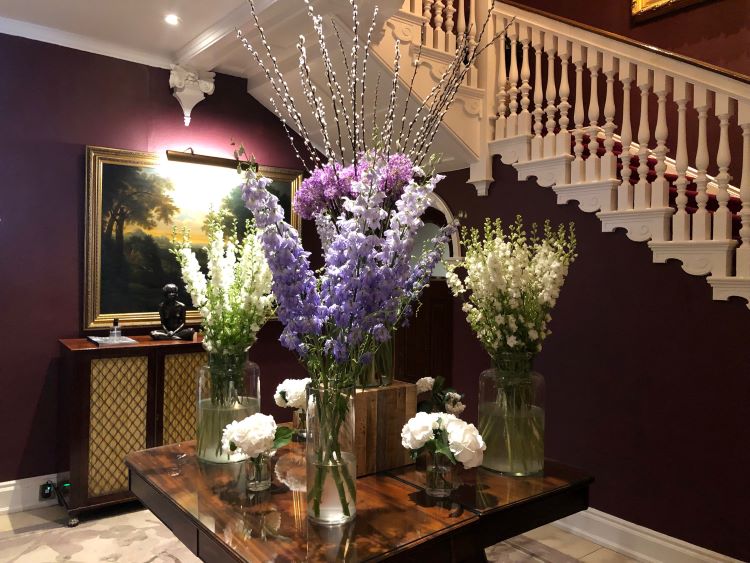 Chewton Glen hallway entrance floral display 