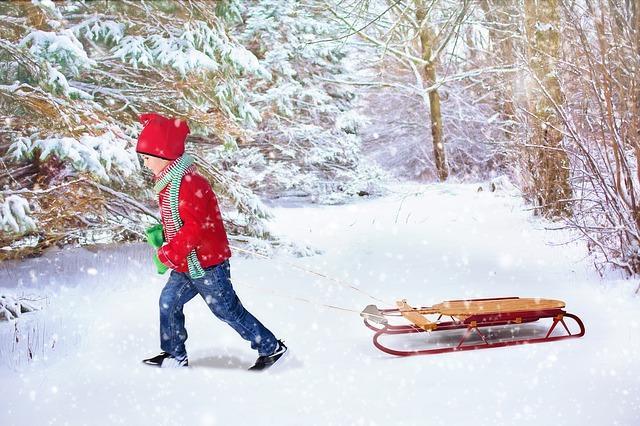 White Christmas with boy pulling sled