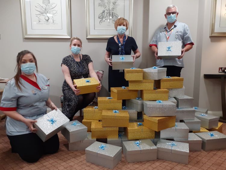 With hamper boxes inside Bourne View are, from left: Companionship Team member Zoe Rose, Home Manager Jenna May, Customer Support Advisor Julie Steele and Companionship Team member Brian Ramsay.