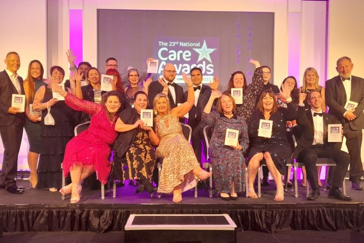 WINNERS. On stage with all this year’s National Care Award winners, are, seated first, second and third left respectively: Kim Gritt, Kingfishers Care Co-ordinator, Clinical Lead Zoe Mills and Home Manager Beata Brzozowska. Kingfishers won the Care Team of the Year category. 