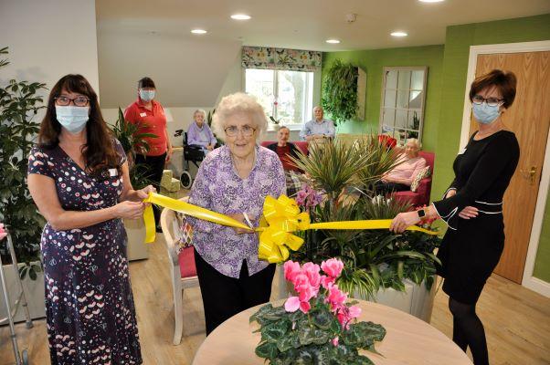 ribbon cutting of botanical interior Belmore Lodge