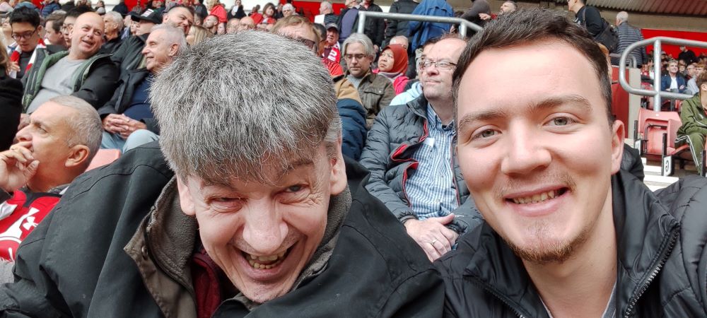Two happy gentlemen enjoying an outing to St Marys Stadium Southampton