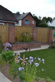 Artificial grass in a Lymington garden Debby Lockey May14