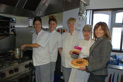 The Oakhaven catering team cook the delicious meals provided to cancer patients by Nourish by forca