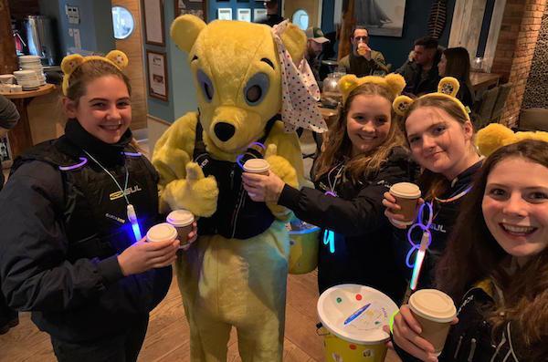 Members of the Junior Committee accompany Pudsey around Lymington to raise funds 