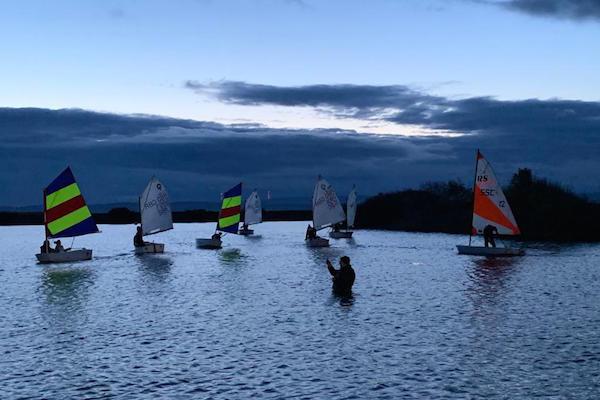 Salterns Bronze fleet sailing as the sun comes up on Saturday 600x400