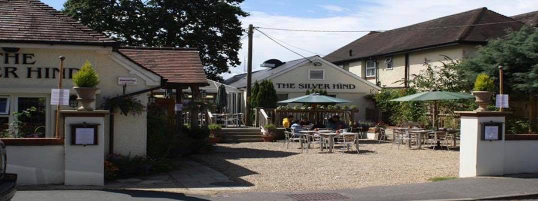 Silver Hind pub entrance and garden Sway