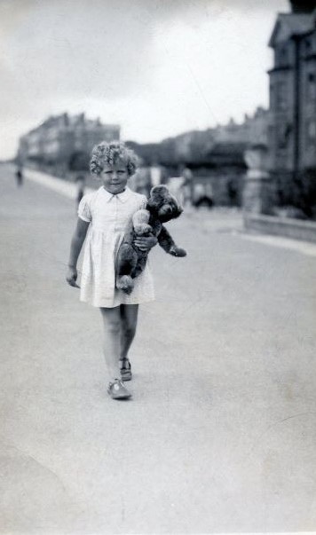 Rosalind Ransome walking with Teddy Edward in the 1930s