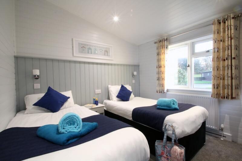 Stunning self-catering lodge accommodation (Pictured: Select+ and Superior+ lodges at Shorefield Country Park)