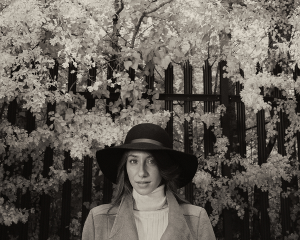 Woman under blossom tree